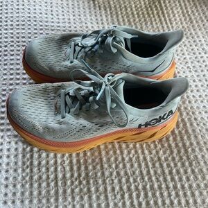 Hoka Light Blue and Orange Athletic Shoes